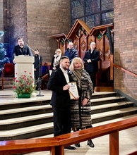 Dyrygent chóru odbiera Dyplom